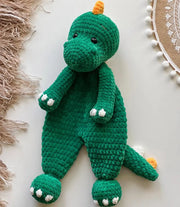 Crochet dinosaur snuggler