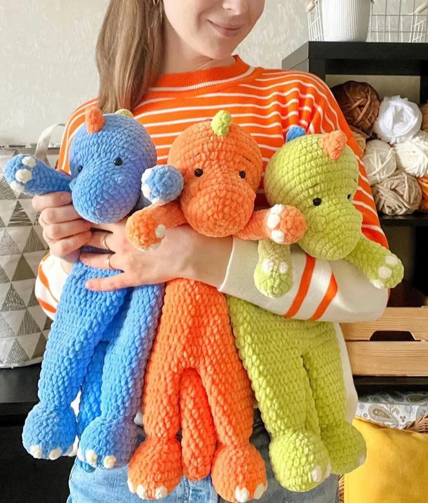 Crochet dinosaur snuggler