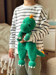 Crochet dinosaur snuggler
