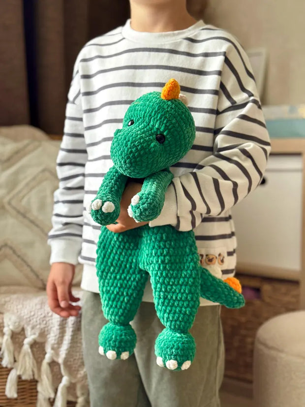 Crochet dinosaur snuggler