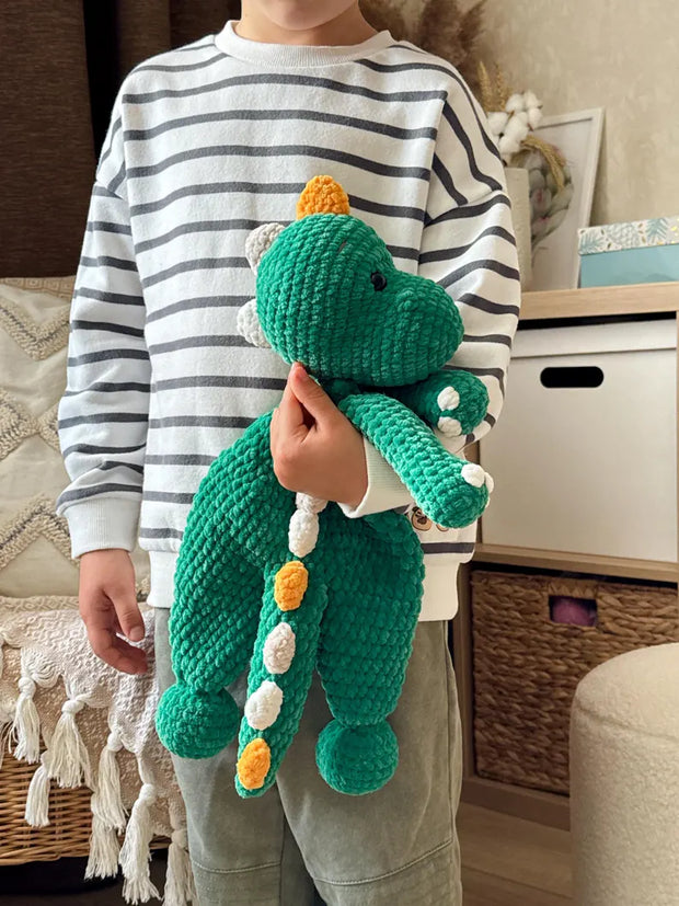 Crochet dinosaur snuggler